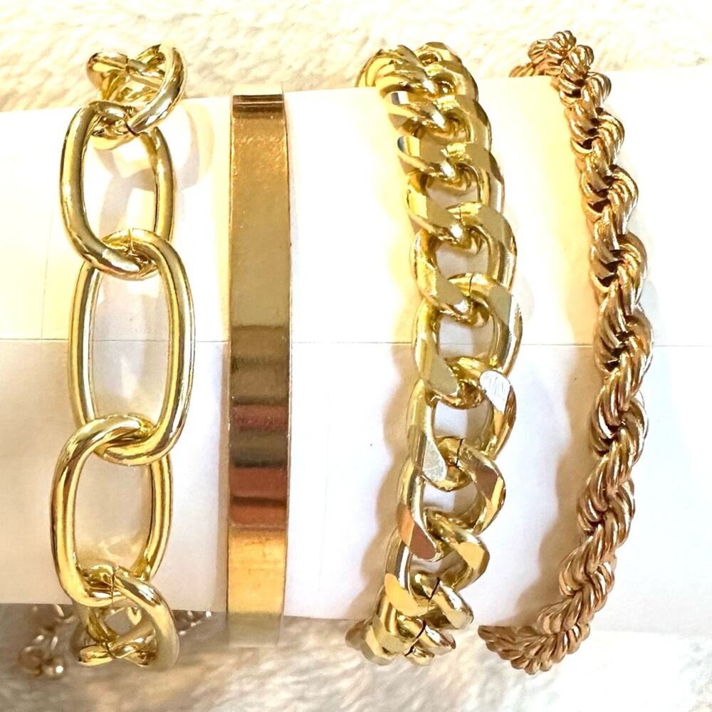 Stack of 4 gold bracelets chain chunky